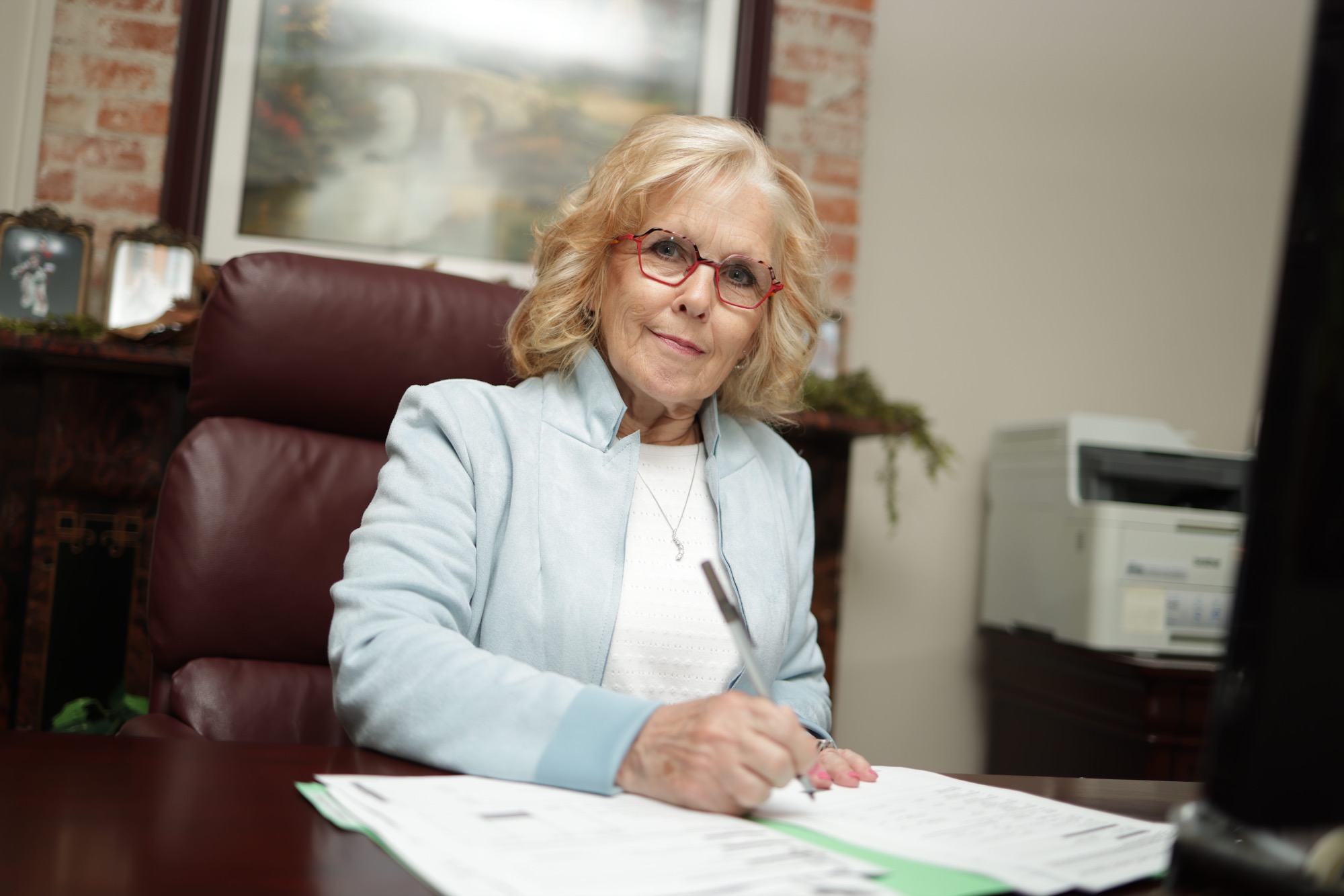 AccountMaster team member working at a desk
